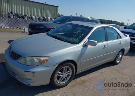 2004 Toyota Camry Le from USA, damaged, VIN 4T1BE32K74U267334